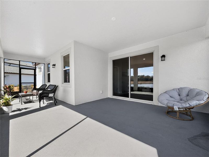 Exterior details and patio area of a home in Shortgrass at Two Rivers, Zephyrhills (Image 23).