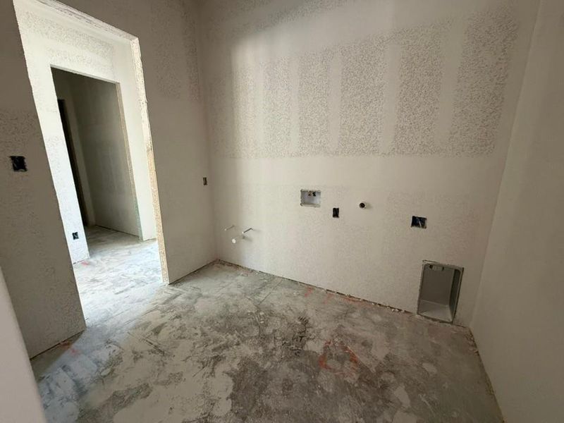 Washroom featuring washer hookup and gas dryer hookup