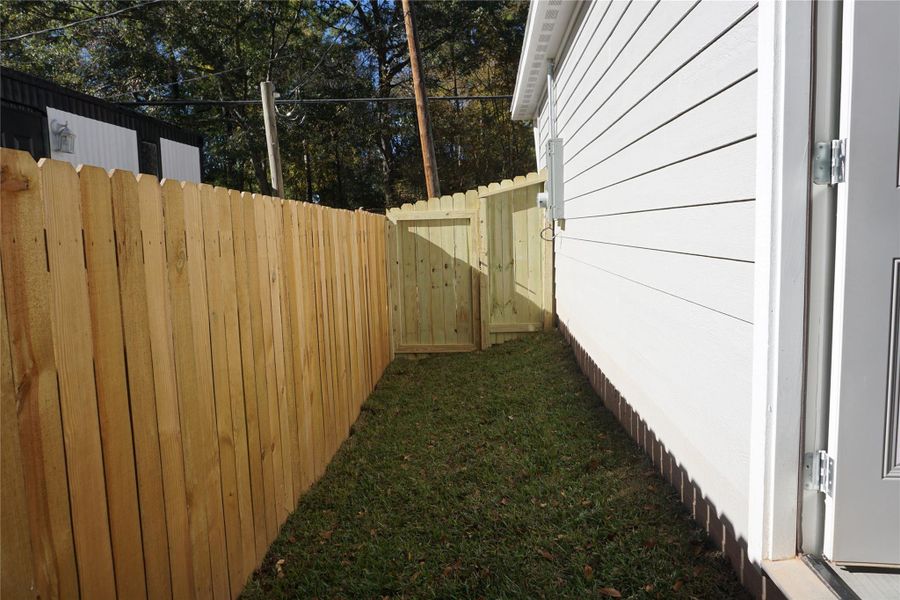 Exterior details and patio area of a home in , Willis (Image 21). Exterior details and patio area of a home in , Willis (Image 21).