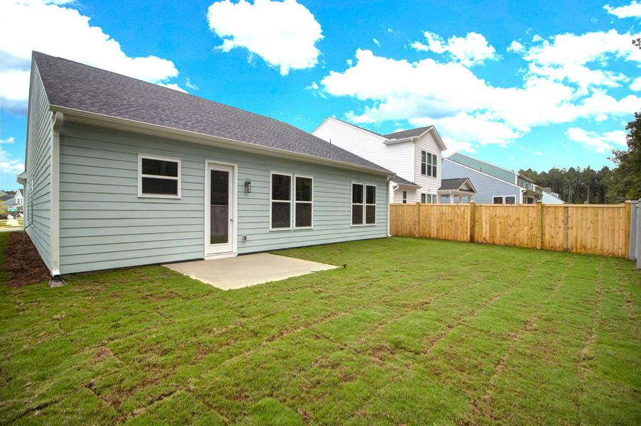 Exterior details and patio area of a home in , Ravenel (Image 22).