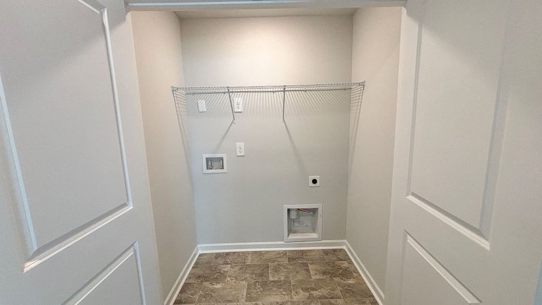 Representative furnished interior of a home built from the GREENBRIAR by D.R. Horton in Parkside Point, Portland (Image 5).
