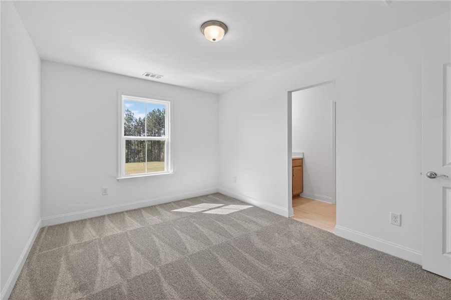 Spacious, unfurnished interior of a new home in Riversprings, Dacula (Image 51).