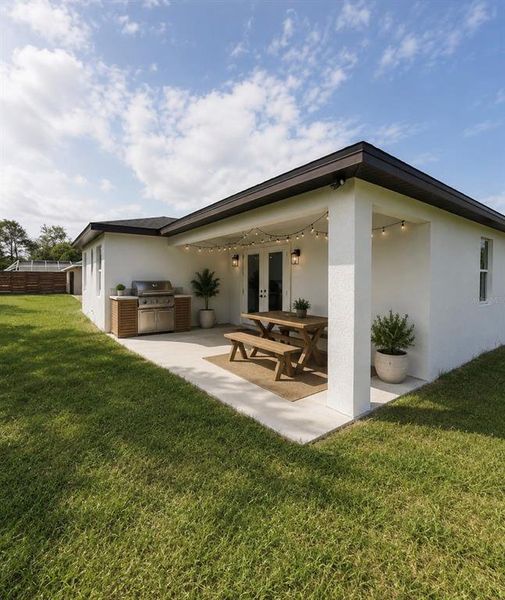 Exterior details and patio area of a home in , Spring Hill (Image 4).