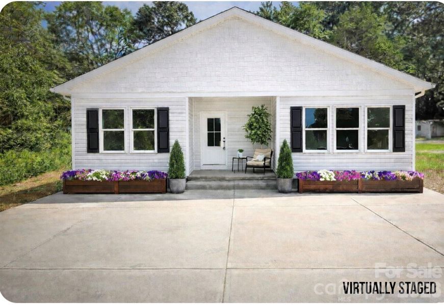 Front exterior of a new home in , Rock Hill, SC, highlighting curb appeal (Image 1). Front exterior of a new home in , Rock Hill, SC, highlighting curb appeal (Image 1).