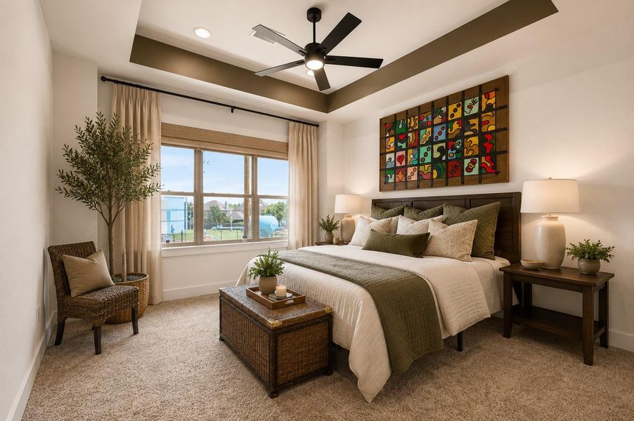 Private primary retreat featuring recessed ceiling detail, oversized windows, and a calm, airy atmosphere.