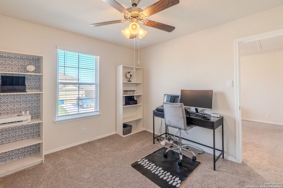 Furnished interior view inside a new home in The Links at River Bend, Floresville (Image 27).