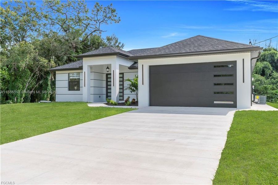 Front exterior of a new home in , Lehigh Acres, FL, highlighting curb appeal (Image 1). Front exterior of a new home in , Lehigh Acres, FL, highlighting curb appeal (Image 1).