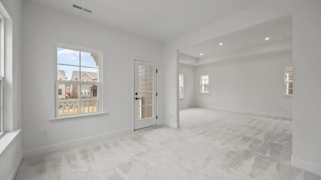 The Brentwood Plan by DRB Homes in River District, Charlotte NC.- Primary Bedroom with Sitting Area