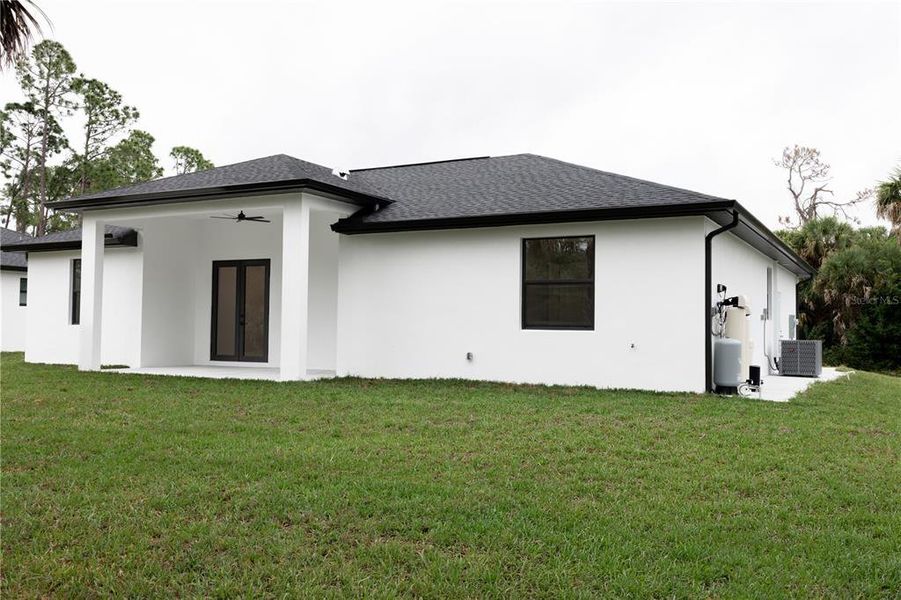 Exterior details and patio area of a home in , North Port (Image 23).