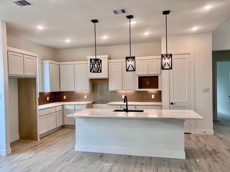 Furnished interior view inside a new home in Wood Leaf Reserve, Tomball (Image 6).