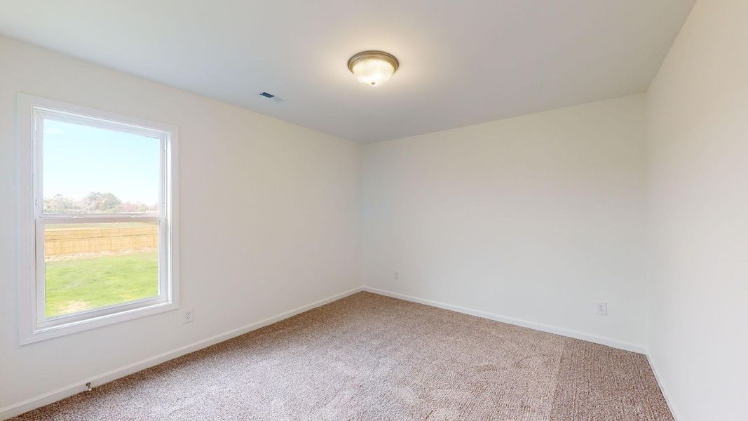 Representative unfurnished interior of a home built from the Yorkshire A by JC Jackson Homes,LLC in Heritage Pointe, Newport (Image 28).