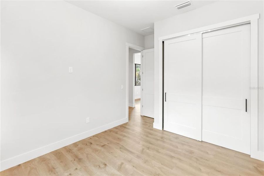 Spacious, unfurnished interior of a new home in , Port Charlotte (Image 27).