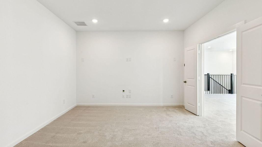 Representative unfurnished interior of a home built from the Tristan by Normandy Homes in Rainwater Crossing, Celina (Image 14).