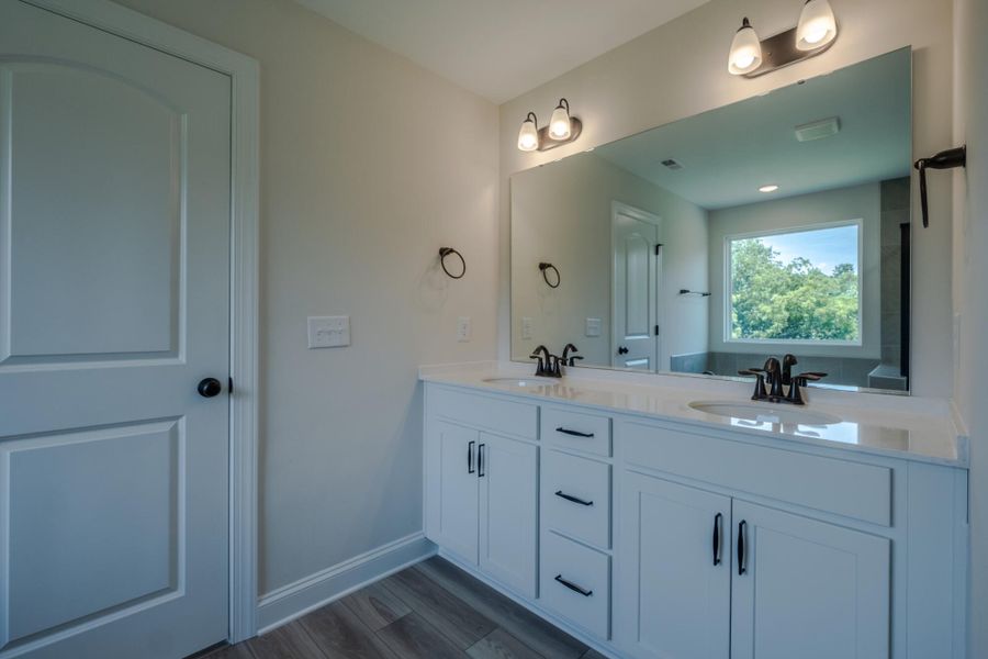 Furnished interior view inside a new home in Cottages at Piper Village, Trinity (Image 13). Furnished interior view inside a new home in Cottages at Piper Village, Trinity (Image 13).