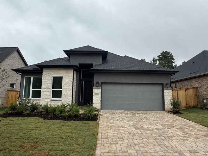 Front exterior of a new home in Kresston, Montgomery, TX, highlighting curb appeal (Image 1). Front exterior of a new home in Kresston, Montgomery, TX, highlighting curb appeal (Image 1).