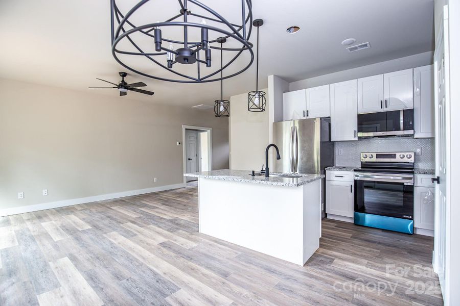 Furnished interior view inside a new home in , Hickory (Image 5).