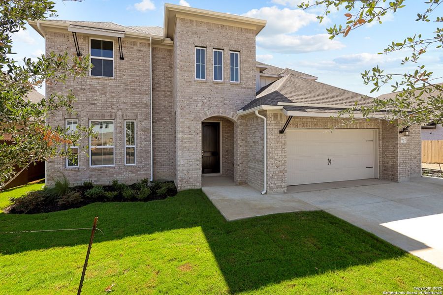 Front exterior of a new home in Stillwater Ranch 60', San Antonio, TX, highlighting curb appeal (Image 17).