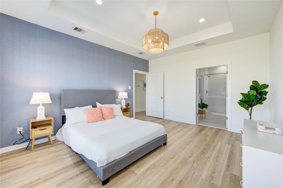 Primary suite featuring abundant natural light and generous layout