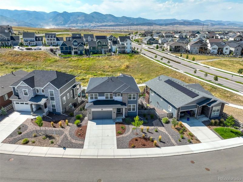 Front exterior of a new home in , Littleton, CO, highlighting curb appeal (Image 19).