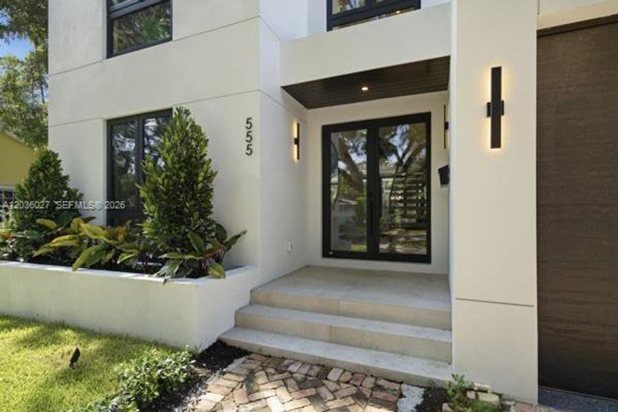 Exterior details and patio area of a home in , Coral Gables (Image 3).