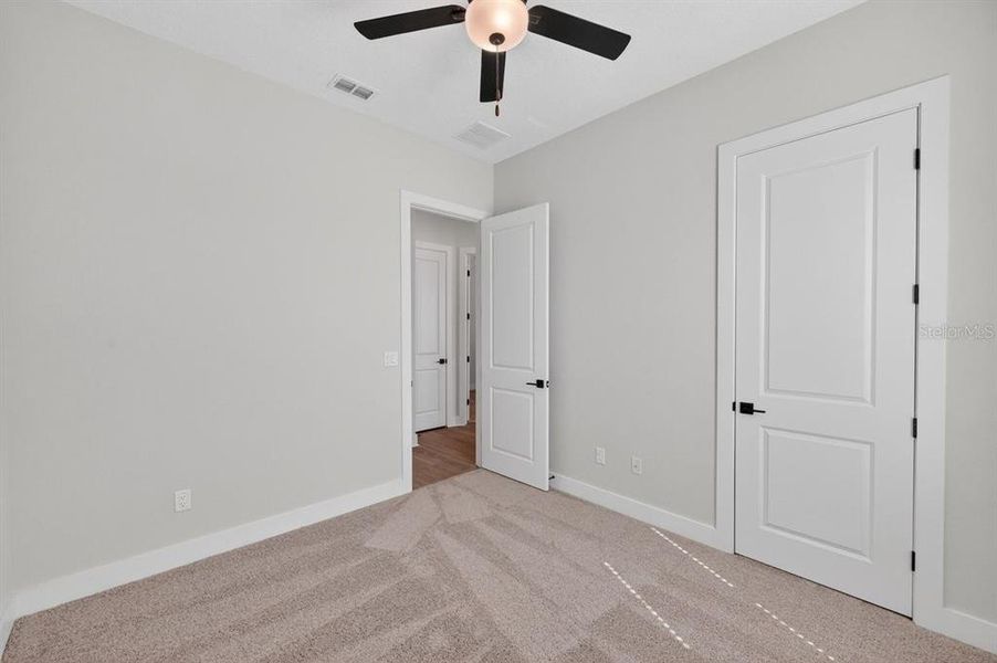 Spacious, unfurnished interior of a new home in Stables at Cary Forest, Bryceville (Image 36).