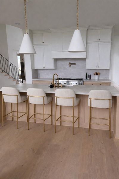 Luxurious kitchen finishes as chosen by our premier design center. Representative image. Luxurious kitchen finishes as chosen by our premier design center. Representative image.