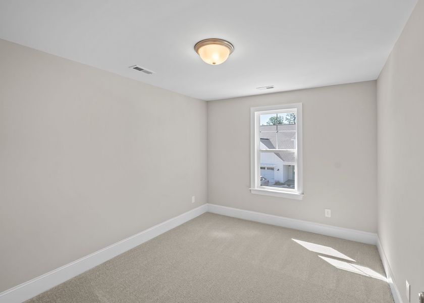 Spacious, unfurnished interior of a new home in Carolina Creek, Hampstead (Image 30).