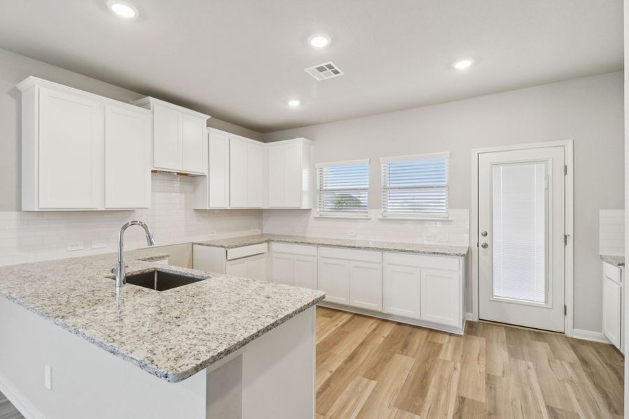 Furnished interior view inside a new home in Legendary Trails - Premier Series, Cibolo (Image 6).