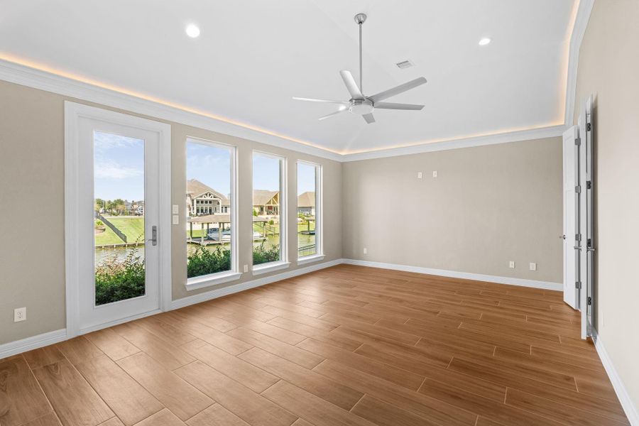Serene primary suite designed for comfort and relaxation, featuring an airy layout and abundant natural light.