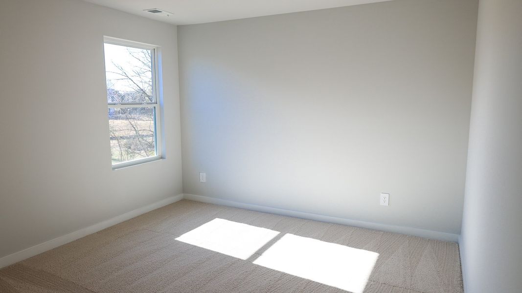 Representative unfurnished interior of a home built from the STONEBROOK II by D.R. Horton in Harvest Point, Spring Hill (Image 53).