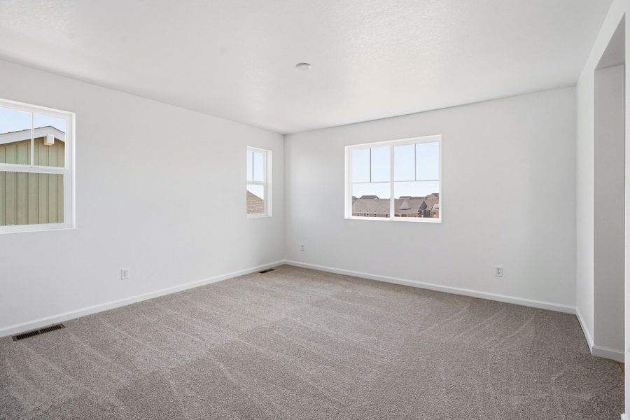 Representative unfurnished interior of a home built from the Eagle II by Taylor Morrison in The Town Collection at Independence, Elizabeth (Image 24).