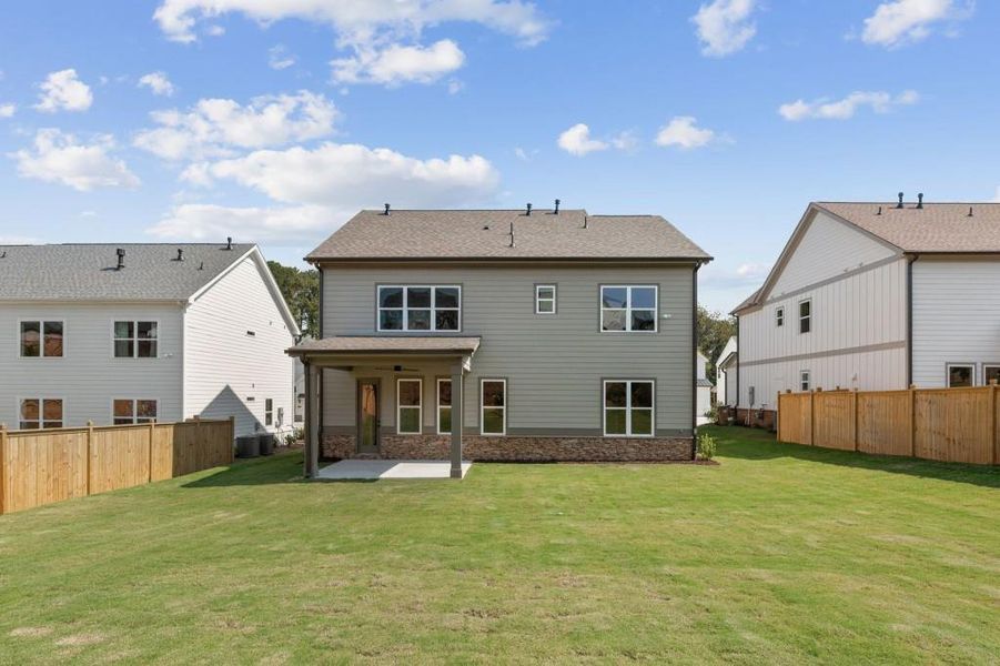 Front exterior of a new home in Hillshire, Cumming, GA, highlighting curb appeal (Image 21). Front exterior of a new home in Hillshire, Cumming, GA, highlighting curb appeal (Image 21).