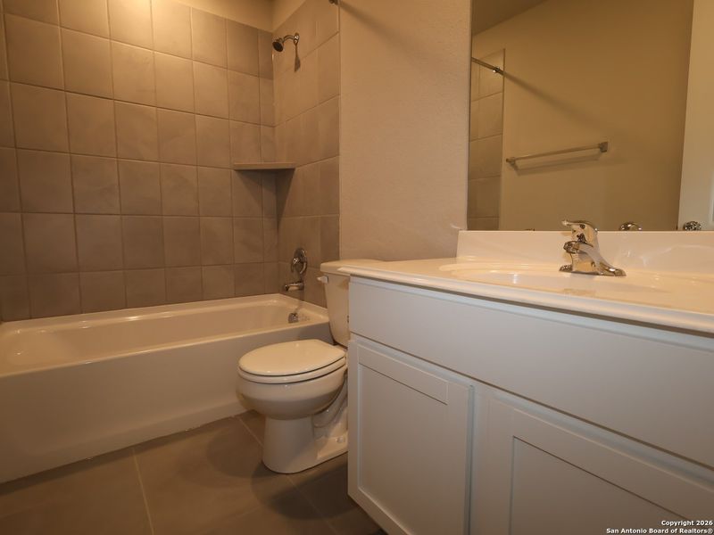 Furnished interior view inside a new home in Winding Brook, San Antonio (Image 11).
