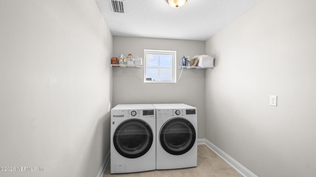 Furnished interior view inside a new home in Settler's Landing at Nocatee, Ponte Vedra (Image 24).