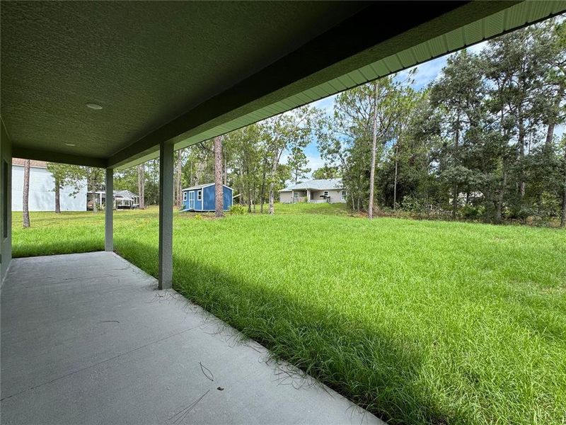 Exterior details and patio area of a home in , Citrus Springs (Image 28).