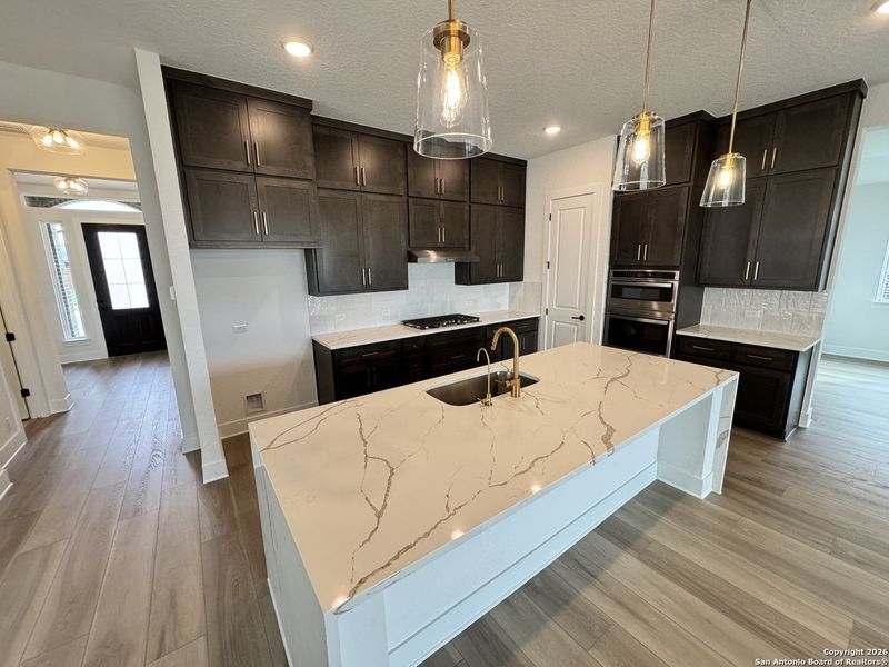 Furnished interior view inside a new home in Megan's Landing 70's, Castroville (Image 7).