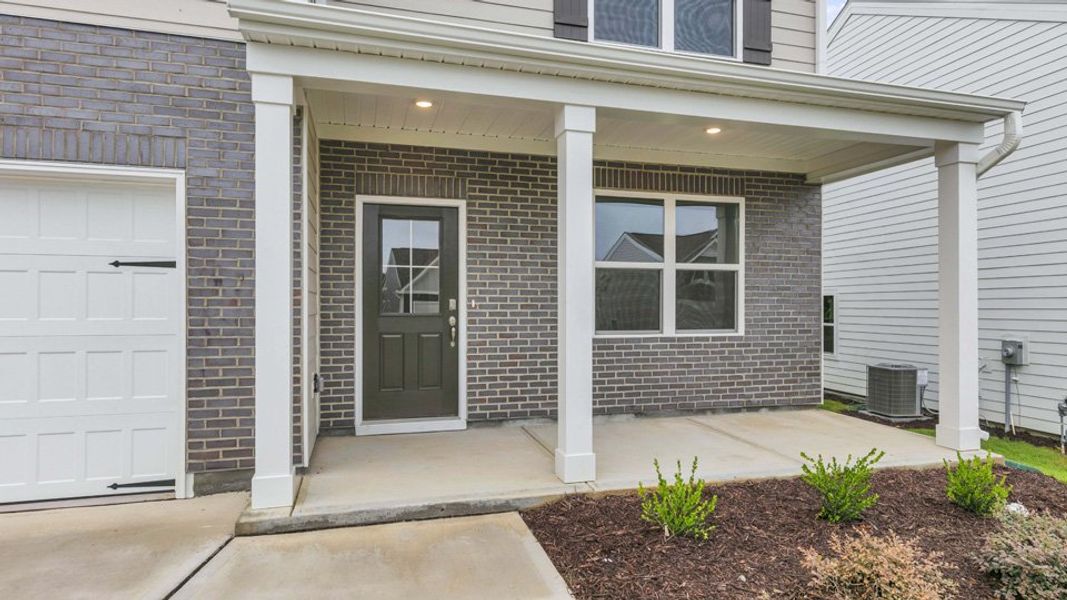 Exterior details and patio area of a home in Villa Grande, Winterville (Image 3).
