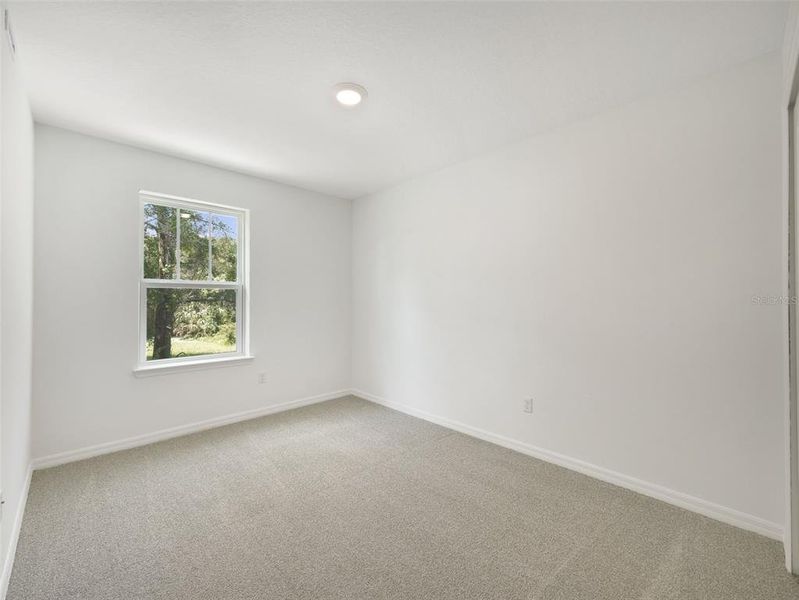 Spacious, unfurnished interior of a new home in Towns at Greenleaf, Oviedo (Image 18).