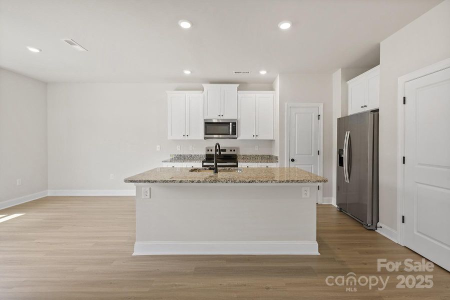 Furnished interior view inside a new home in Ascot Woods, Charlotte (Image 4).