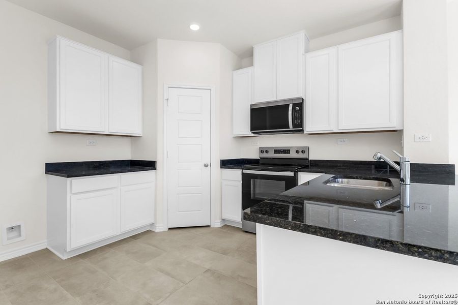 Furnished interior view inside a new home in Spanish Trails, San Antonio (Image 7).