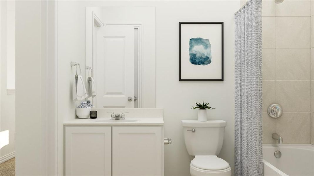 Full bathroom featuring shower / bath combo, toilet, and vanity