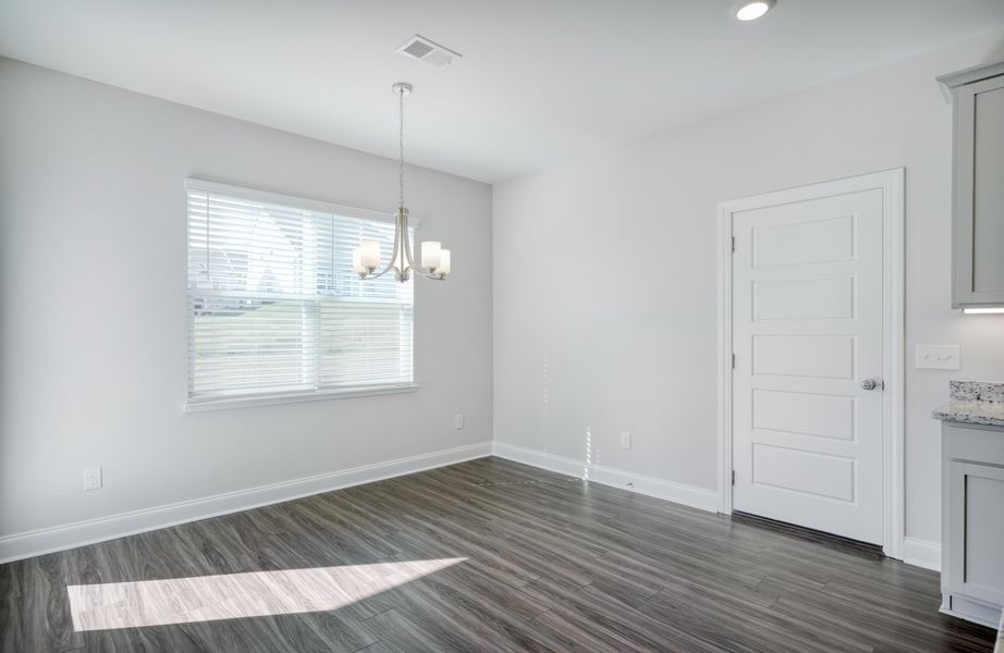 Representative unfurnished interior of a home built from the The Calle by Cothran Homes in Holly Ridge, Greenville (Image 17). Representative unfurnished interior of a home built from the The Calle by Cothran Homes in Holly Ridge, Greenville (Image 17).