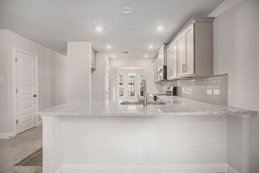 Furnished interior view inside a new home in Kiber Reserve, Angleton (Image 4).