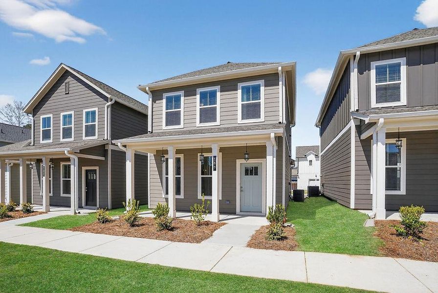 Front exterior of a new home in , Fayetteville, GA, highlighting curb appeal (Image 2). Front exterior of a new home in , Fayetteville, GA, highlighting curb appeal (Image 2).