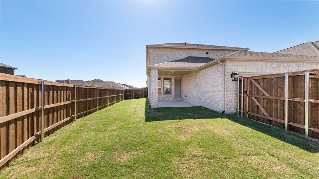 Exterior details and patio area of a home in The Parks At Wilson Creek 40', Celina (Image 2). Exterior details and patio area of a home in The Parks At Wilson Creek 40', Celina (Image 2).