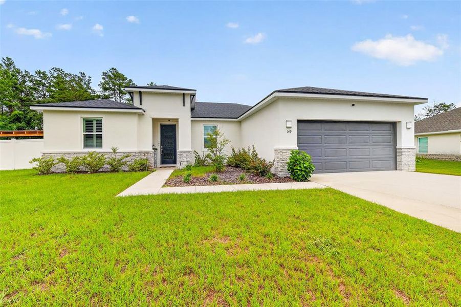 Front exterior of a new home in Ocala, Ocala, FL, highlighting curb appeal (Image 21).