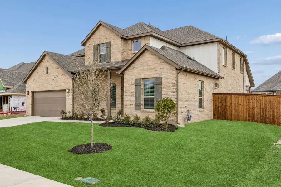 Front exterior of a new home in Dove Hollow, Waxahachie, TX, highlighting curb appeal (Image 2). Front exterior of a new home in Dove Hollow, Waxahachie, TX, highlighting curb appeal (Image 2).