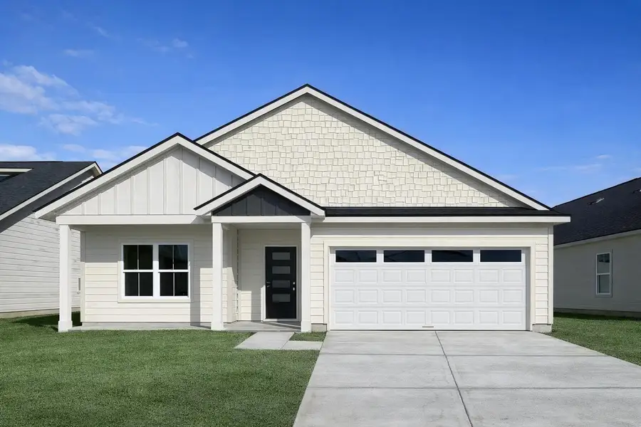 Front exterior of a new home in Hill & Dale Ranch, Splendora, TX, highlighting curb appeal (Image 1). Front exterior of a new home in Hill & Dale Ranch, Splendora, TX, highlighting curb appeal (Image 1).
