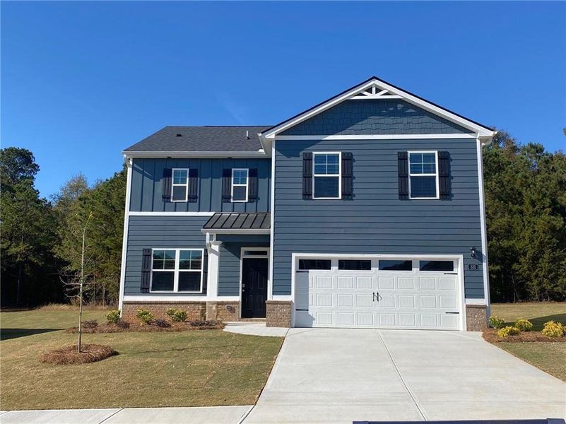 Front exterior of a new home in Preserve at Dove Creek, Statham, GA, highlighting curb appeal (Image 26).