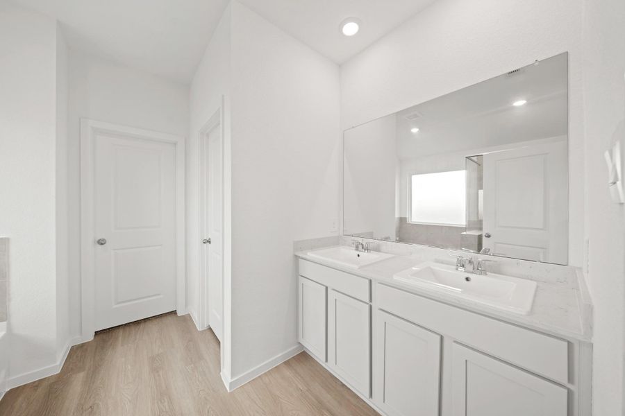 Furnished interior view inside a new home in Sunterra Lakes, Brookshire (Image 6).